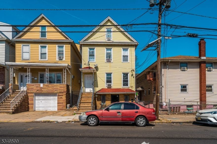 Exceptional mixed-use property offering incredible rental income potential. The ground floor features a high-visibility storefront, ideal for retail or office use, while the upper levels include fully updated residential apartments with strong tenant appeal. A bonus unit adds even more flexibility use it as an additional income stream, in-law suite, or home office. All units are well-maintained and tenant-ready, making this a turnkey investment opportunity. Whether you're building your portfolio or seeking a live/work setup, this property generates consistent cash flow in a prime location close to major transportation, shopping, and commuter routes. A smart, income-producing asset with long-term upside.