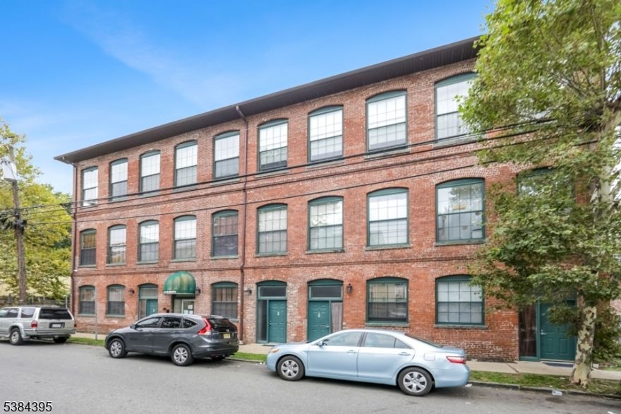 This unique multi-floor 1-bedroom, 1-bath condo is nestled in the desirable Hillcrest section of Paterson, NJ. Featuring dramatic double-story ceilings in both the living room and bedroom, the home offers an open, airy feel with abundant natural light. Enjoy the convenience of in-unit laundry, central air and heat, and one assigned parking space. The spacious layout includes a bright living area, full bathroom, and a loft-style bedroom with great privacy. Located in a quiet residential neighborhood close to parks, schools, public transportation, and major highways, this condo blends comfort and style perfect for first-time buyers or savvy investors