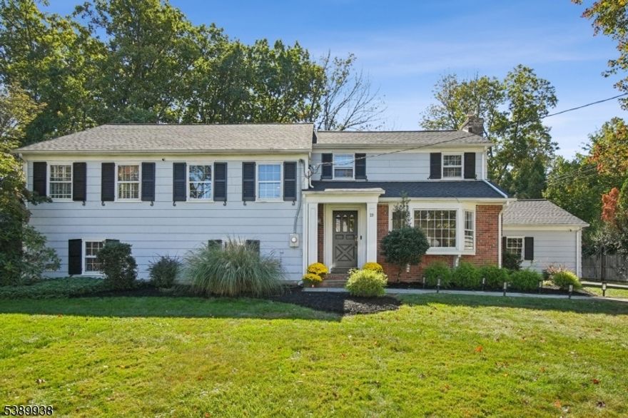Fabulous expanded & renovated Colonial-Split in highly desirable Poets Section! Stunning gourmet eat-in kitchen, crisp white cabinets, quartz counters, top of the line stainless steel appliances, new Miele DW & new Wolf gas range w/gas FP & vaulted ceiling, pantry, 2 oversized Franke sinks w/ 2 disposals, desk area, wine rack totally open to Family rm w/ 5 new skylights, perfect open floor plan. Living rm w/ bay window, gas FP, dining rm w/ French doors. All new light fixtures 1st level, gleaming refinished hardwood floors, great entertaining space w/ powder room tucked into long entrance hall w/ 2 closets. 2nd level features 3 bedrooms, 2 gorgeous newer baths w/ skylights including the original primary bedroom w/ 2 walk-in closets & a beautiful, large en-suite bath. 3rd level up a few steps & features a luxurious primary suite, all freshly painted, w/2 single closets & 1 walk-in closet off of the spa-like bath w/ double sinks, skylight + oversized shower. Few steps up is a HUGE attic w/tons of storage & attic fan. Ground level features a large rec room w/ 3 windows, cedar closet, office / 5th bedroom w/ separate entrance & powder room. New HVAC 2024, Smart House features heat,AC,garage security, new gas hot water heater 2022, new roof 2021, new garage doors 2025,EV charger 2024. Ideally located on a quiet street in the Poets section walking distance to Hartshorn Elementary School (ranked #3 in NJ), & Gero Park, the town's recreation center w/ tennis, golf & town pool.