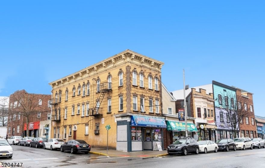 Opportunity Knocks! Rare 6 unit all brick apartment building with 1500 warehouse in back on desired Main Ave, Passaic. Property consists of 5 apartments (3 of the apartments are fully renovated and all 5 are rented.) Roof, boilers, water tanks all less than 10 years old and all utilities except the water are paid by tenants. Great cash flow! Steps to the NJ Transit Bus Line Rt 46, Rt 80 and the GSP.This is an excellent opportunity and will not last.