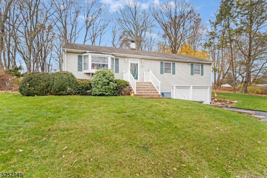 Welcome to this updated 3 bedroom, 2 full bathroom raised ranch house on an oversized level lot with a large 2 car garage.  Enjoy the outdoors while spending time on the very large deck that measures 20 feet by 32 feet.  The updates are numerous and include the kitchen with granite counters, driveway in 2022, AC compressor in 2023, new oil tank 2021, front stairs in 2021 and new garage doors/openers in 2020. Generator in the garage is included with the sale.