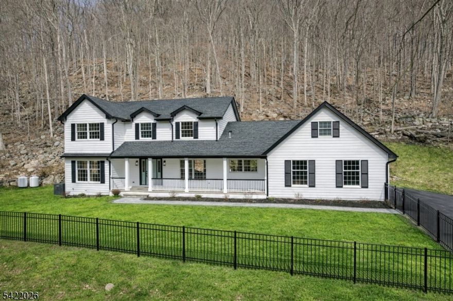 Welcome to this beautifully renovated home set on a private wooded lot in Tewksbury Township, offering a seamless blend of rustic charm and modern updates. This 5-bedroom, 3 full and 2 half bathroom home features a spacious open floor plan with a natural flow between the kitchen, living, and dining areas, ideal for both everyday living and entertaining. The primary suite offers an ensuite bathroom and walk-in closet, while an upstairs laundry room adds everyday convenience. The ground level provides two additional bedroom options, perfect for guests or flexible use such as a home office. The finished basement expands the living space with a massive recreation room, a dedicated storage room, and an additional flex space. Additional highlights include high ceilings, a backup generator, and thoughtful updates throughout. Conveniently located near Routes 78, 22, and 31, and just minutes from Lebanon, Califon, and Clinton, with access to local shops, restaurants, and nearby outdoor recreation, including Round Valley Reservoir, Voorhees State Park, and the Columbia Trail.