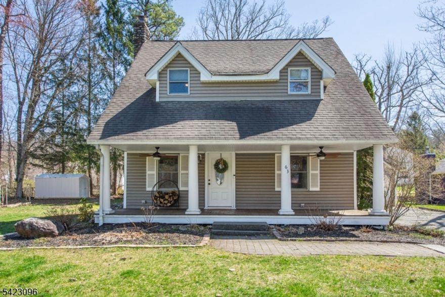 Beautiful 4-bedroom, 2.5-bath Colonial located in the desirable Awosting neighborhood. This inviting home features a spacious covered front porch with mahogany wood flooring and ceiling fans, perfect for relaxing. Inside, the functional layout offers a cozy family room with a wood-burning stove and a bright living room with a wood-burning fireplace. The kitchen includes a charming breakfast nook and flows into a generously sized dining room, ideal for everyday living and entertaining.The main level also features a convenient laundry room and powder room with stylish barn doors. Upstairs, you'll find four bedrooms, including a spacious primary suite with a private bath and walk-in closet, along with a beautifully updated full hall bath. Additional highlights include a lower level with a workout area or flexible space. Outside, enjoy a 1-car detached garage, paver patio, and backyard ideal for relaxing or entertaining. Central air, public water and sewer, plus a generator hook-up complete this home. Enjoy all that this vibrant lake community has to offer clubhouse, private beaches, swimming, boating, fishing, tennis courts, new basketball courts, playgrounds, and a full calendar of year-round social activities, including community gatherings. Floor Plans Available.