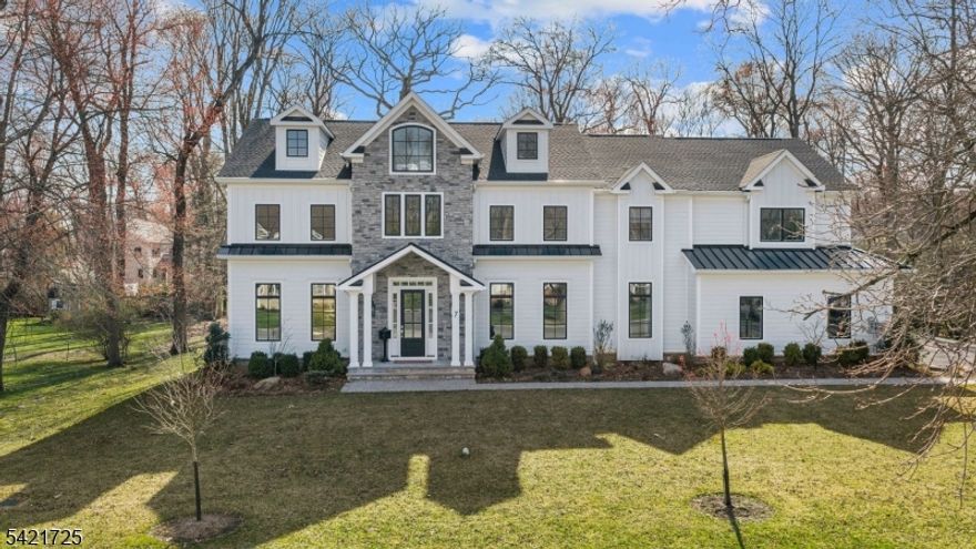 Experience luxury living in this custom 1-year-old home, perfectly situated on an oversized lot backing to serene woods in Florham Park. Designed with exceptional craftsmanship and an emphasis on comfort, this six-bedroom residence offers an impressive blend of modern amenities, thoughtful layout, and timeless style. A grand two-story foyer sets the tone upon entry, complemented by 10' ceilings on the first floor and 9' ceilings on the second. The main level features a spacious family room with gas fireplace, a formal dining room, a private library with double glass pocket doors, and a first-floor en-suite bedroom ideal for guests or an office. The custom kitchen is the heart of the home, showcasing 42 cabinetry with crown molding, a large center island, quartz countertops, GE Caf appliances, a walk-in pantry, and a butler's pantry leading to the dining room. Upstairs, the luxurious primary suite stands out with two full en-suite bathrooms, each with its own walk-in closet an exceptional design offering privacy and convenience. Four additional en-suite bedrooms, a second-floor laundry room with built-in cubbies, and a dedicated computer/homework room complete this level. A full finished third floor with a half bath provides even more flexible living space. Outdoor living shines with a 24' x 14' covered loggia, complete with an outdoor kitchen grill, sink, bar cabinet, and under-counter refrigerator plus a designated TV area perfect for entertaining.