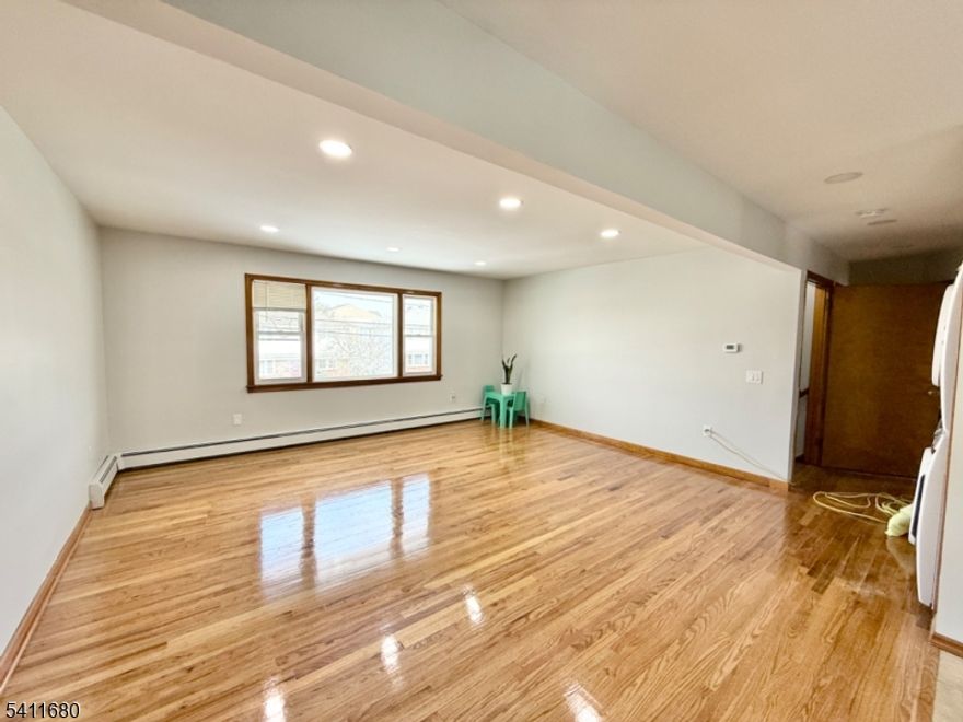 Welcome to this bright and spacious second-floor rental, offering two large bedrooms and a huge open-concept layout perfect for comfortable living. The expansive eat-in kitchen flows seamlessly into the living room, creating an ideal space for relaxing or entertaining. This unit features a brand-new washer and dryer in-unit for added convenience. Located on a quiet cul-de-sac street, this home offers plenty of street parking and a peaceful setting while being close to shops, dining, and public transportation. A wonderful opportunity to enjoy space, comfort, and convenience all in one place.