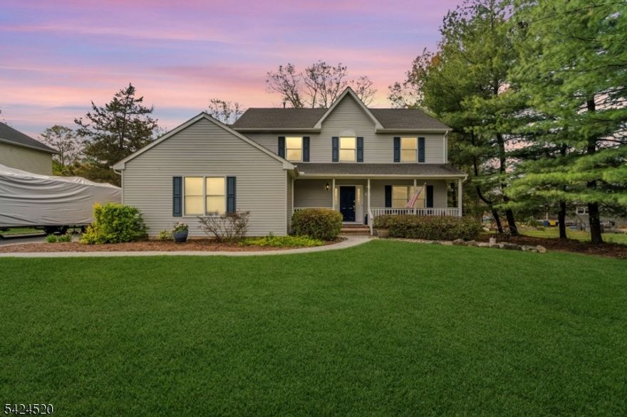 Impressive Colonial offering the perfect blend of space, comfort, and seamless flow, set on a beautifully maintained property along a picturesque, storybook street with charming curb appeal. A welcoming front porch leads into a bright foyer with vaulted ceilings, creating an open and airy first impression. The main level features generously sized living spaces designed for both everyday living and entertaining, with a natural flow between the kitchen and family room. The spacious eat-in kitchen opens effortlessly into the inviting family room, ideal for gathering and relaxation. Sliding doors lead to a large deck, extending your living space outdoors and overlooking the expansive, level backyard?perfect for entertaining, play, or quiet enjoyment. Upstairs, you'll find four well-proportioned bedrooms, including a comfortable primary suite, along with two full baths and a convenient powder room. Recent updates include Trex deck (5 yrs), driveway (2 yrs), and two furnaces and central air systems (1 week & 2 yrs). A wonderful opportunity to own a home that combines classic design, functional layout, and a truly desirable setting.