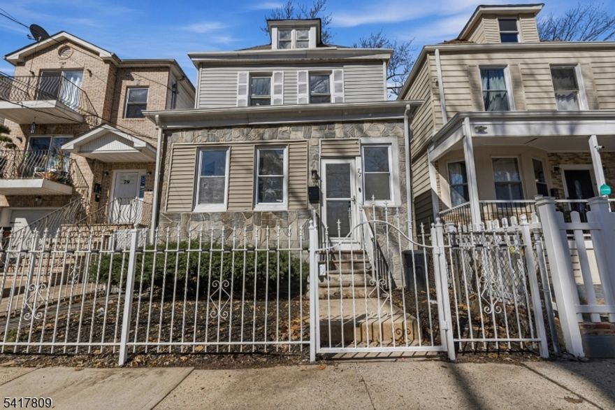 Welcome to this renovated Colonial offering a spacious and functional layout designed for comfortable everyday living. This home features five bedrooms and three full bathrooms, providing flexibility for a variety of living needs. The main level includes bright living and dining areas, a fully updated kitchen with modern cabinetry, stylish countertops, and contemporary fixtures, along with a full bathroom that creates the option to convert part of the first floor into a bedroom. Interior upgrades include luxury vinyl flooring, fresh paint, and quality finishes that enhance the home's modern appeal. The second floor offers four well-sized bedrooms and a full bathroom, while the finished attic provides a fifth bedroom with ample closet space suitable for extended living or a home office. A fully finished basement with a full bathroom and exterior entrance adds valuable extra space for recreation, flexible living, or storage. Additional features include a dedicated laundry area and a newly installed HVAC with Central Air Cooling. Exterior highlights include a private fenced backyard and ample street parking. Situated on a quiet street in the desirable Lower Vailsburg section, the home is conveniently located near parks, schools, and major highways including the GSP. Extensively renovated and move-in ready, this property presents a strong opportunity for buyers seeking space, comfort, and modern updates.