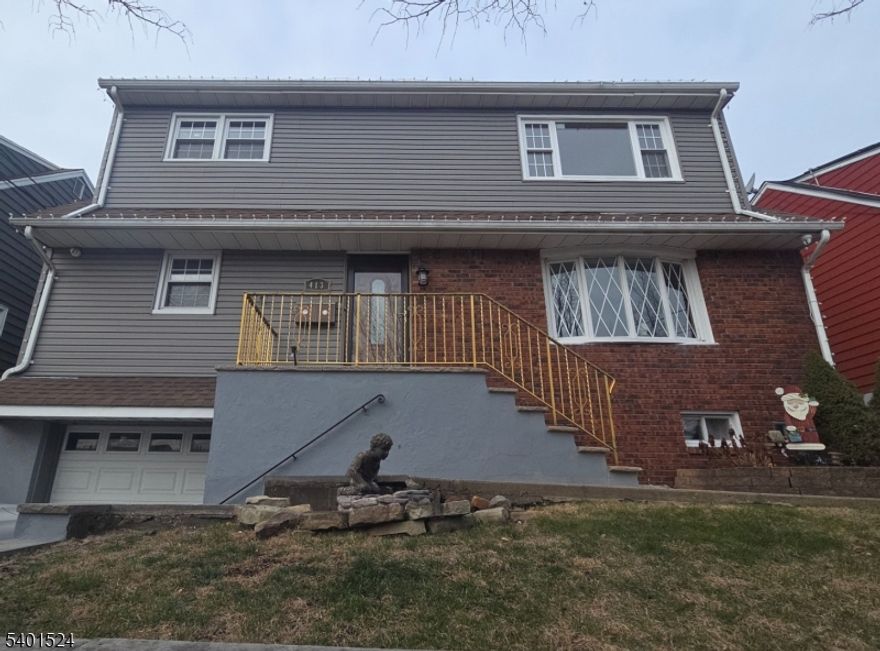 Welcome to this beautiful, bright, spacious move in ready 3 bedroom apartment located on the 2nd floor of owner occupied residential neighborhood. Features a newly renovated bathroom, in unit washer and dryer and a large bright living room with hardwood floors overlooking the scenic view of New York city. Minutes away from shopping center, schools, restaurants and highways. Nothing to do but move right in. Welcome home!