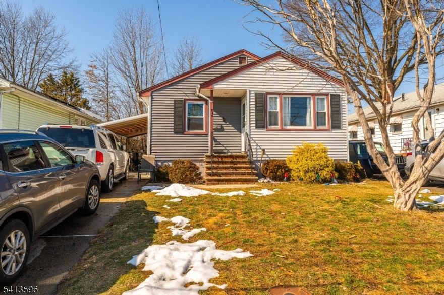 This charming ranch offers an opportunity to plant roots in a vibrant neighborhood. From the moment you pull into the driveway, you're greeted by a welcoming facade featuring classic siding and a covered carport that adds both convenience and character. The interior opens into a bright, inviting living space where hardwood floors flow seamlessly underfoot, creating a warmth throughout. The heart of the home is undoubtedly the updated kitchen, boasting crisp cabinetry, modern stainless steel appliances, and a stylish subway tile backsplash that makes meal prep a delight. Comfort is key in the well-appointed bedrooms, including a spacious primary bedroom and a versatile secondary room currently styled with a playful, creative touch. The bathrooms have been thoughtfully refreshed, featuring contemporary vanities and tasteful tile work that provide a clean atmosphere. For those seeking extra space, the expansive finished basement is a true "bonus" feature ready for a home theater, recreation room, or a private home office. Outside you'll discover a fenced backyard designed for both relaxation and utility. Whether you're hosting summer BBQs, watching pets play, or utilizing the detached storage shed for your hobbies, this outdoor space is a good find. Located just minutes from local amenities and buses, and less than a mile from the Linden train station.