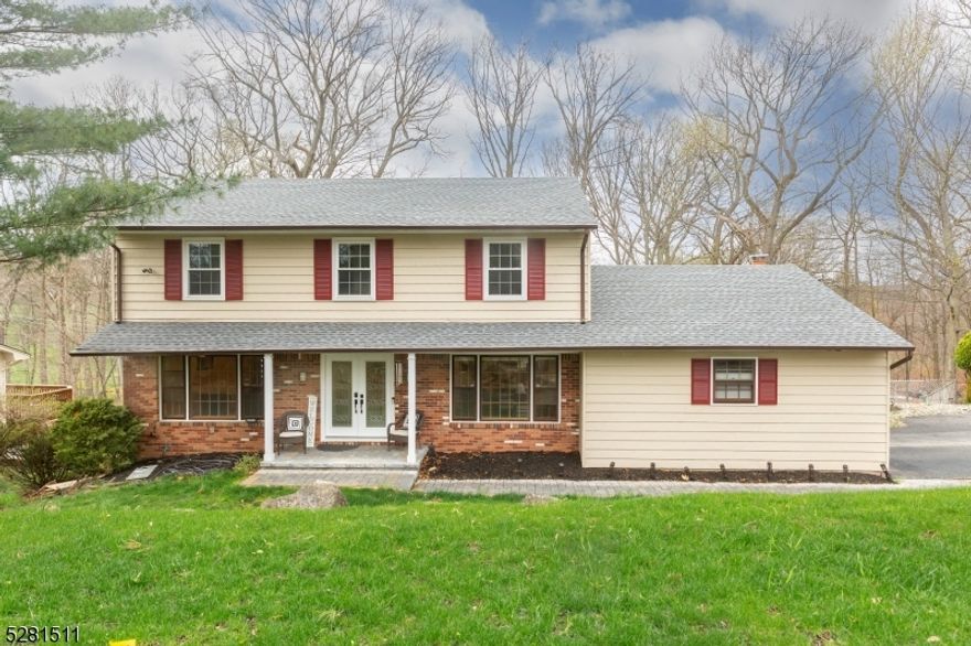 Welcome to 1 of the most sought out neighborhoods in Parsippany-Troy Hills where the perfect balance of quiet & convenience awaits! Envision yourself coming home to this one-of-a-kind, spacious 4 bedroom, 2.5 bath Colonial w/a JAW-DROPPING view of the Mount Tabor Country Club Golf Course! Enjoy several different beautiful vantage points of the vast Mt. Tabor Golf course from the serene and idyllic leveled fenced-in backyard. Endless nights of relaxation & entertainment await on the expansive 2-tier wood deck w/paver patio below Enter into a spacious bright & airy foyer w/added light from the sunlight beaming through the windows in the Living Rm on the left & the Formal Dining Rm on the right. Open floor plan flows seamlessly from the Dining Rm into the Kitchen & into the Family Rm. Upgraded Kitchen w/amenities galore including a center Kitchen Island w/Granite Countertop, drawers & Cabinet  w/built-in Microwave Oven. Stainless Steel appliances coupled w/loads of upgrades leave this Kitchen nothing short of perfection. As you walk up the wide staircase to the 2nd floor, you will find 4 spacious bedrooms and 2 full bathrooms. Full finished basement w/17 recessed ceiling lights and wood-like laminate flooring. 2-yr old roof, EV charger outside garage, underground lawn irrigation system; the list is endless! This ideal location makes mornings a breeze if you commute Routes 287, 80 & 46 all just minutes away.  This home truly encapsulates elegant living w/peace, privacy & beauty!