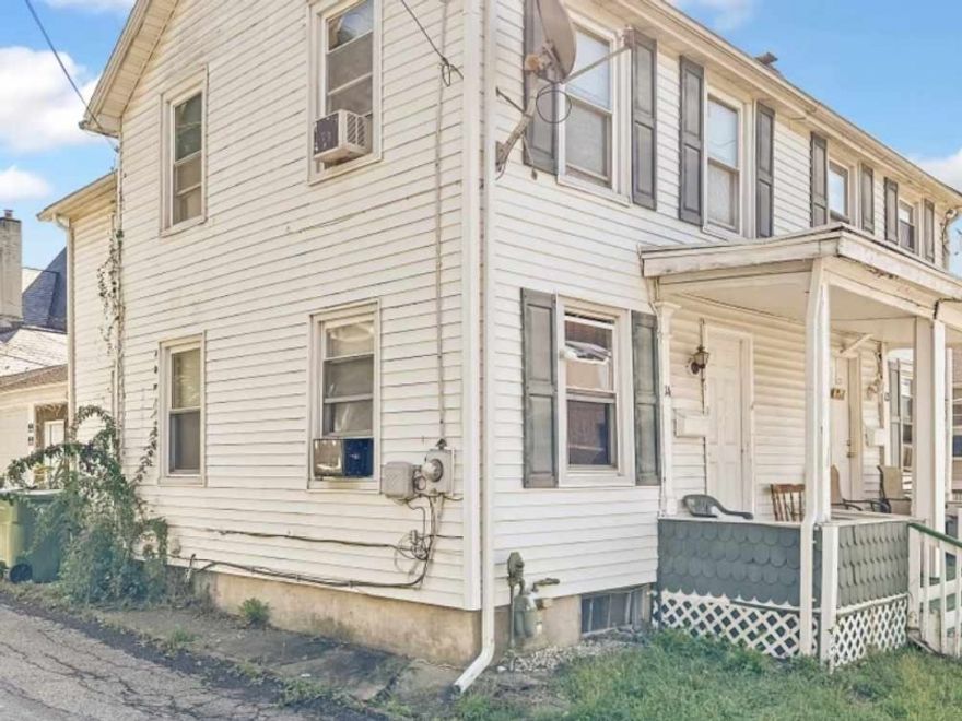 Attn: Contractors & Investors this is a golden investment opportunity in the heart of town! This newly vacant 3-bedroom, 1-bathroom half-duplex presents an ideal prospect for savvy investors. Boasting an unbeatable location within walking distance to the town center and shopping, and close proximity to major transportation routes (57, 31, 78, and 22), this property offers convenience and accessibility. What sets this property apart is the Unique Opportunity to purchase both units as a package, making it perfect for investors looking to expand their portfolio. Alternatively, you can live in one unit while benefiting from rental income from the other. With public utilities and natural gas heat, the property is equipped for low maintenance success. This property offers a great income potential with TLC and updates. Additional features include a walk-up attic and basement for extra storage space and covered front and rear porches for outdoor enjoyment. This opportunity is competitively priced " don't wait! Whether you're a seasoned investor or someone looking to enter the rental market, this duplex is your ticket to long-term financial growth. Property being sold "AS IS" Seller would prefer to sell with 12 School Street, MLS # 3877334