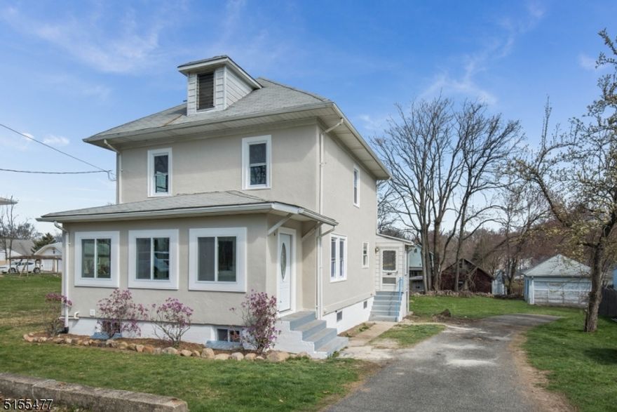 Welcome home to this completely remodeled colonial in a great neighborhood in the heart of Rockaway. Beautiful hardwood floors run throughout the entire home. Period cut custom trim adds beauty and charm. Remodeled kitchen has beautiful granite countertops, stainless appliances and access to a private deck, perfect for outdoor dining or entertaining. Living room, dining room, family room, full bath, and heated sun-porch round out the 1st floor. Second floor had 3 bedrooms, full bath and access to a walk-up attic with plenty of storage. Huge basement offers laundry room, storage, and outdoor access. Large level lot on great quiet street. Picture Perfect.