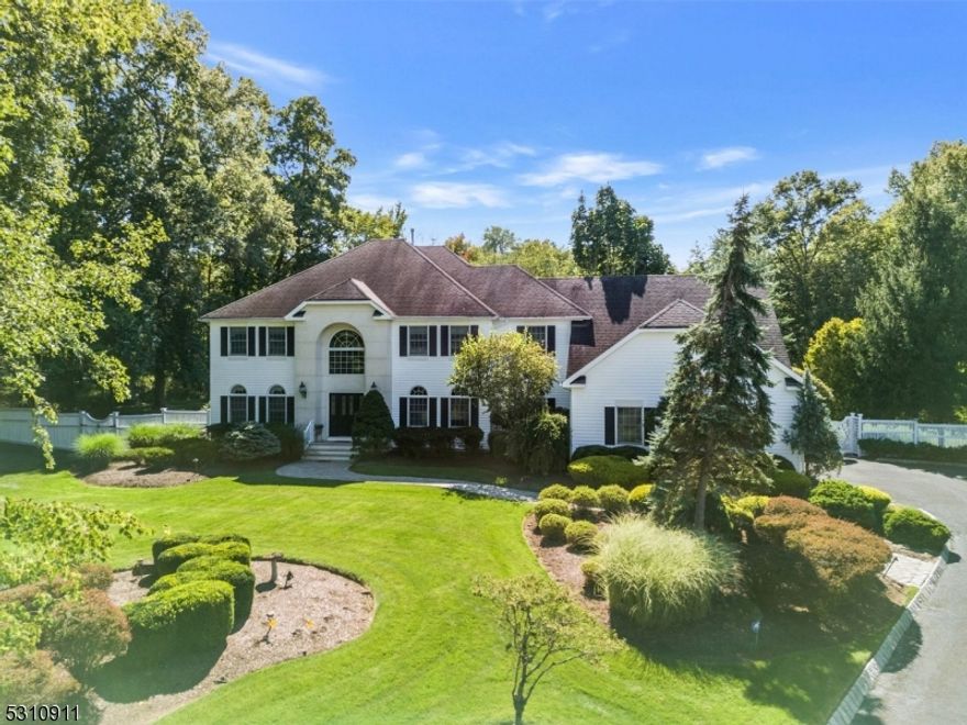 This spectacular custom colonial home in The Beacon Manor section of The Hills has five bedrooms and five and one-half bathrooms. It faces Northeast and offers a range of features, including an in-ground pool, spa, and a flat fenced-in rear yard, perfect for playground and parties. The gourmet eat-in kitchen is equipped with stainless steel appliances and a walk-in pantry and opens to a stunning two-story family room. A spacious home office completes the first level. The primary bedroom ensuite has a vaulted ceiling, a sitting area, and two walk-in closets. There are four more bedrooms, three of which have full baths. The fully finished open-concept basement includes a full bath, lounge area, game area, fitness room, and storage. The basement has direct stair access to the expansive three-car garage. Recent interior painting, as well as hardwood refinishing. Newer carpeting on bedroom 2nd floor and the lower level. Other property features include a fenced-in pool area. This is truly an outstanding opportunity you wouldn't want to miss! Highest and best offers are due on 9/25.