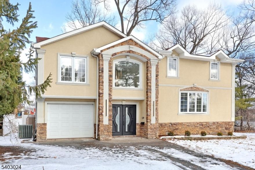 Welcome to this stunning modern residence offering the perfect blend of sleek design, functionality, and comfort. A dramatic two-story entry foyer makes a striking first impression, filled with natural light and accented by contemporary architectural details. The open-concept main level showcases clean lines, wide-plank flooring, recessed lighting, and seamless flow between the living, dining, and kitchen areas, ideal for both everyday living and entertaining. The spacious kitchen, equipped with new stainless-steel appliances and a large quartz island, opens effortlessly to the dining area. Living spaces feel airy and refined, enhanced by oversized windows that flood the home with natural light. The primary suite offers a serene retreat with generous space and a luxurious en-suite bath, while additional bedrooms are thoughtfully designed and well-appointed. The finished basement expands the living space with two finished rooms and a full bathroom, offering flexibility for a home office, gym, guest suite, or recreation area. A convenient laundry room/mudroom located off the garage adds everyday ease. Outside, enjoy a generously sized, fenced yard, perfect for entertaining, play, or relaxing in privacy. Throughout the home, refined finishes and thoughtful details create a modern, polished aesthetic, making this residence a rare combination of style, comfort, and contemporary living.