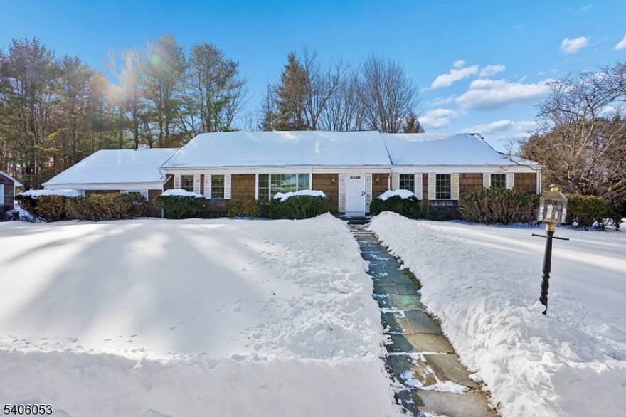 Conveniently located on the east side of Chester Township, this home sits on a 2 AC  corner lot with a spectacular northeast facing view from the front. Detached 875 sq foot oversized garage in addition to two car attached garage. Three bedrooms on first floor, two on second. Second floor expandable into unfinished attic. Roof '21, gutters '20, garage doors '24, attic fan '21, asphalt course on drive '23, well tank '20 replaced windows '12, front door '19 Three full baths. Hardwood floors throughout. Large family room with wood burning fireplace and brick surround. Great layout, make this your own! Quick access to Mendham and Morristown. Award winning school district. WM Mendham HS is an IB school. Quaint Main St. State, county and local walking trails nearby.