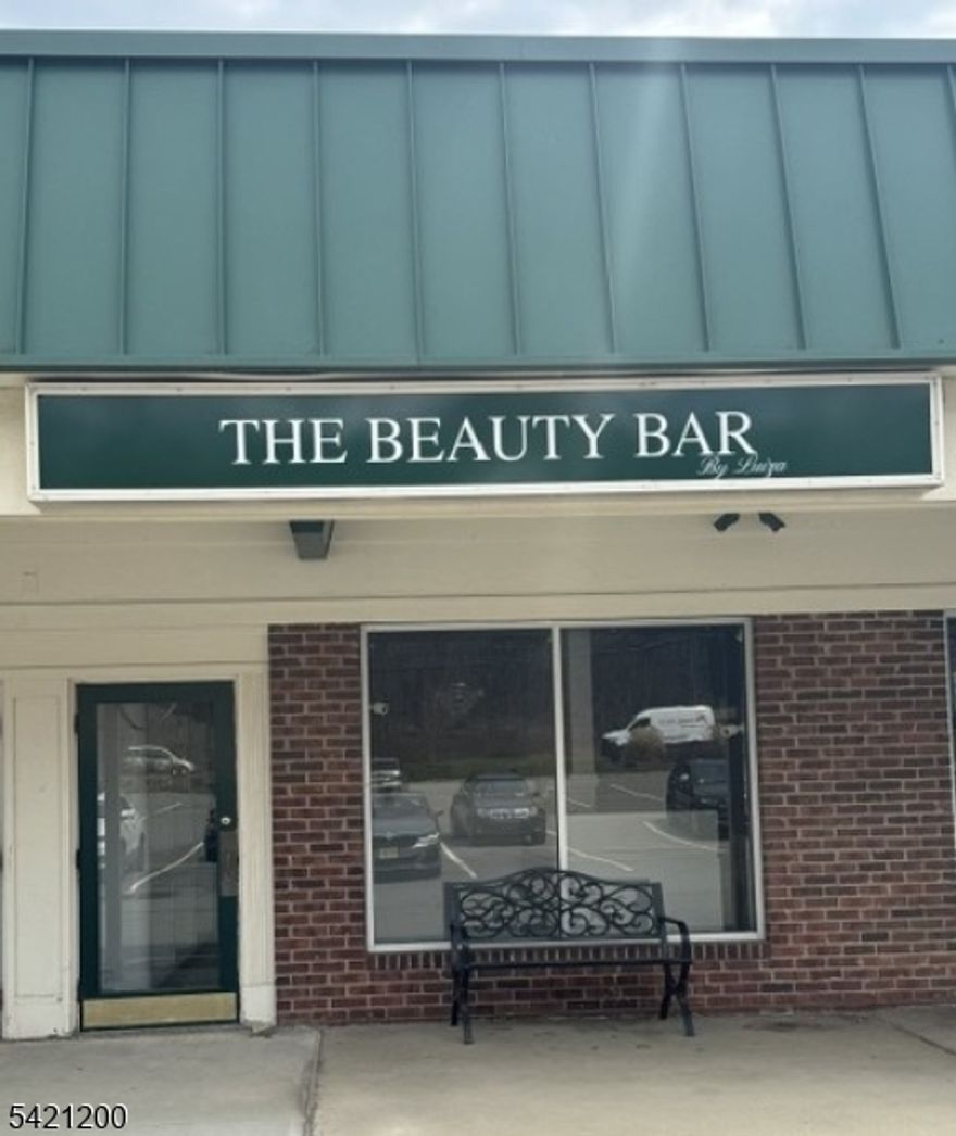 Approved turnkey Hair Salon space with private rooms for Body Wax, Eyelash Extensions or other approved licenses by NJ State Board of Cosmetology and Hairstyling. Laundry room in the rear