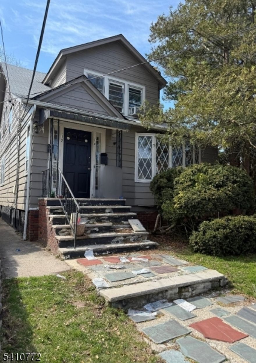 Opportunity knocks in desirable Maplewood with this 2-family fixer-upper w/ 6 rooms and 2.5 baths located on a corner lot with a double garage. Offering strong upside for investors, contractors, or owner-occupants looking to create value. This property offers approximately 2,100+ sq ft of living space and is currently configured with a 3-bedroom first-floor unit with the ability to convert into a 4 bedroom by converting the kitchen into a bedroom and having an open plan kitchen concept in the dining/living toom or the dining room into a bedroom. Large full basement with 2 additional rooms and the possibility to add a 3rd room, half bathroom and a large recreational area. The second floor has a spacious 1-bedroom second unit with potential for a 2-bedroom reconfiguration.  The home is dated and in need of repairs and updates throughout. This is an ideal project for a buyer with vision who can restore and reposition the asset for owner-occupancy, rental income, or long-term appreciation with an after repair value of $950K+. Conveniently located near Maplewood amenities, parks, shopping, dining, and commuter routes, this property offers a rare chance to unlock value in a highly sought-after Essex County location. The buyer is responsible for conducting their own due diligence and for complying with municipal requirements. This property maybe eligible for a grant from our approved lenders. LA has a legal interest in the property.