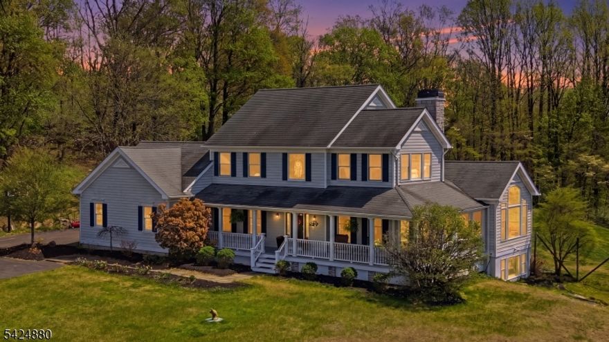 Acreage, privacy, and a storybook Clinton Township setting. The kind of property that rarely becomes available now ready for its next chapter. This beautifully maintained home offers the perfect balance of space, comfort, and convenience, just minutes from major commuter routes, top-rated schools, and Round Valley Reservoir .A charming wraparound front porch sets the tone, inviting peaceful mornings and quiet evenings behind seven stunning, mature maple trees that form a distinctive, natural canopy welcoming you home. Inside, sunlit interiors flow effortlessly, creating warm, inviting spaces ideal for both everyday living and relaxed entertaining. A desirable main-level primary suite provides ease and flexibility, while the 2nd level provides generously sized 3 additional bedrooms and versatile living areas supporting today's lifestyle needs. The bsmt level is part finished with a versatile rec room,  and/or office area. Huge unfinished section offers storage & Bilco doors covenient to the yard. Set on expansive, usable acreage with mature landscaping, the property delivers a true sense of retreat private, serene, and designed for both relaxation and connection. A special opportunity to own land, location, and lifestyle in sought-after Hunterdon County. Security cameras are on the property. Sq Footage per NJACTB.org PLEASE REMOVE SHOES!