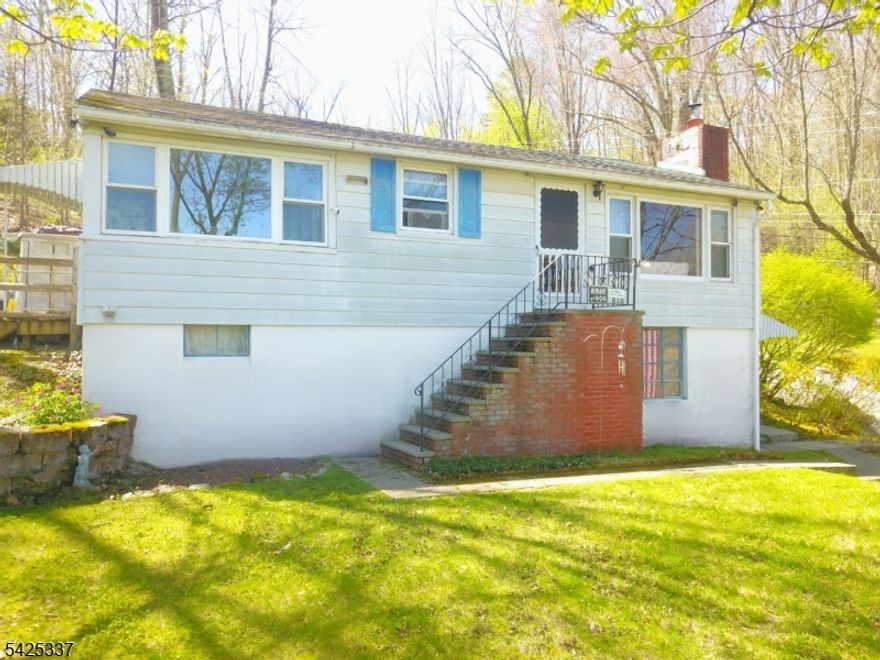 Move right into this well-maintained home in the lovely Lake Neepaulin community! Enjoy all the lake has to offer, all year round, for no additional charges! Sitting on 1/2 acre, the lot runs from corner to corner and the home features 3 bedrooms, 2 full baths with a finished walkout basement that could make a great mother daughter option all on the ground floor with its own separate entrance. Overlook the lake from the country kitchen window, fitted with a gas range and full kitchen amenities. Just off the kitchen you find a very bright and airy dining room that could also be used as a sitting area or additional flex space. The large living room has lovely, vaulted ceilings with an oversized picture window overlooking the front lawn with partial lake views and BOAsts a real wood burning fireplace for those chilly winter nights. Throughout the house you will find tongue and groove ceilings and knotty pine wood panel walls. The home includes a new forced hot air HVAC system with central A/C and has been very well maintained with many newer upgrades, newer roof, vinyl windows, pressure tank, well pump, hot water heater, Roth oil tank and much more. Large, wooded lot with an outdoor storage shed, perfect for your new garden or just relaxing in the cool lake breeze under the many shade trees. Just outside of Sussex borough, enjoy all that the area has to offer. Minutes from the new ShopRite, restaurants and bars, come and see why this may be the home you have been looking for!