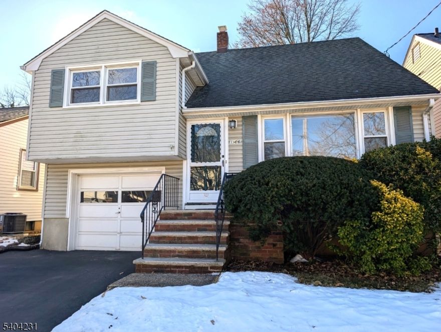 Spacious Split Level Home!! Come see this Immaculately maintained 4 Bedroom Custom Home, you will not be disappointed!  4 Levels of Living spaces Offering: Eat-in Kitchen, Formal Dining Room, Living Room, Recreation Room (with walkout to back patio/yard), Beautiful Hardwood floors, Central A/C, and Partially finished basement. The Large Deck off the Kitchen offers plenty of room for your Grill and Patio set.  Great fenced-in yard too! 1/2 garage for additional storage. This Freshly painted Home is all ready and waiting for its new owner! *COMMUTERS DREAM....just a short stroll to train and downtown shopping and restaruants!!