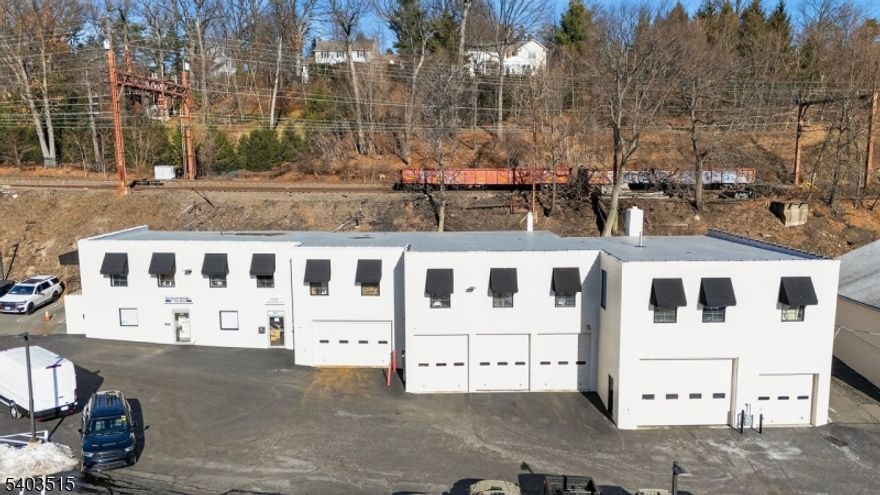 Offered for lease within a prime Summit location is an approximately 4,800 square foot second-floor industrial warehouse featuring high ceilings and functional loading access. The space is well suited for storage, light industrial, or flexible commercial use. The unit includes one private office, a half bathroom, and electric and water included in the rent. Please note, the space is unheated. Despite its second-floor location, the property offers strong functionality with a rear loading dock featuring double doors, allowing for efficient loading and deliveries. Conveniently located with access to major roadways and nearby amenities, this property presents an excellent opportunity for businesses seeking practical industrial space in a highly desirable market.