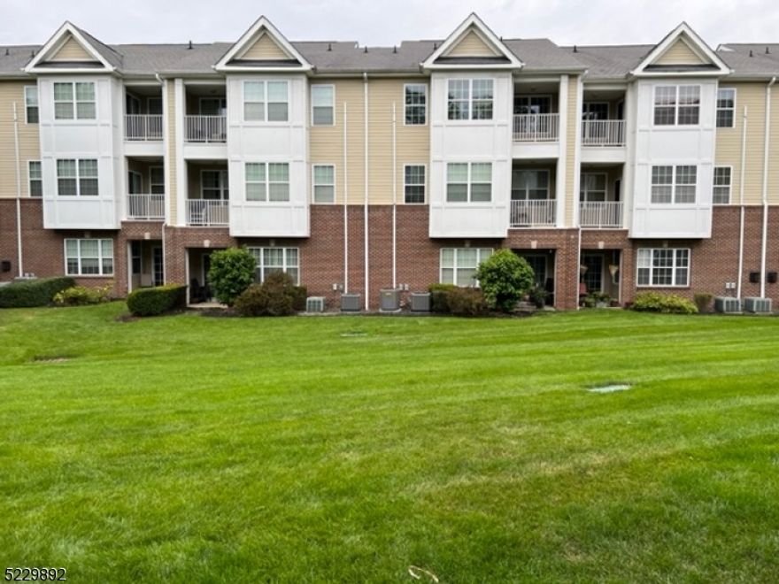 Beautiful and well-maintained 2 bedroom, 2.5 bathrooms in an unbeatable location!  This is modern, open concept living at its finest.  Close to major highways and blocks away from MIDTOWN Direct train to NYC, shopping, dining, entertainment, and to Downtown Morristown and "The Green"! Ground level entry with two floors, sliders to a patio leading out to the manicured complex "meadow",  and an upstairs balcony. Primary bedroom has en-suite full bath with double vanity, as well as Walk-In Closet. New carpets, paint, HVAC and fridge. Wood floors in the main level and in-unit washer and dryer. Attached garage, driveway, and 1 extra assigned parking spot. Dog friendly (weight limit of 50 LBS). The convenience of urban living without the congestion - come make this cozy haven your Morristown getaway!