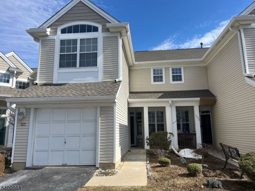 Don't wait to buy when you can experience great townhouse living within the charm of Overlook at Lopatcong and be close to all amenities! Enjoy the warmth of this beautifully maintained sun filed  Gramacy model with 2 bed 2 1/2 bath unit freshly painted. First floor kitchen located off of foyer with kitchen knook, Just off the kitchen is the dining/living room combo with sliders leading to deck. Both bedroom are located upstairs as well as second floor laundry. Partly finished WALKOUT basement.  If you are looking for low maintenance, and in a great community, this is the home for you. Come park your car in the attached garage and unpack today. Excellent commuter location with close proximity to routes 78, 22, and 57. City sewer, water, and natural gas makes living economical and simpler. Includes Trash, Recycling, Snow Removal, Lawn Maintenance, Exterior Buildings, Pool, and Volleyball