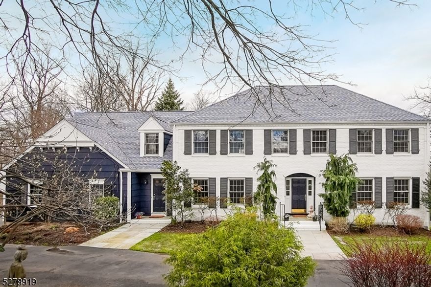 Stunning 5 bedroom, 3.5 baths colonial located on a quiet cull de sac on one of Chathams most special roads. Enter the wide foyer and see the quality thru out , including spectacular views, shiny wood floors and architectural detail. Enjoy the deck, conveniently located off the large kitchen and overlooking spacious lawns. The kitchen features an oversized island and separate dining area.  Step down to a familyroom with fireplace and enlongated windows ( great views). Large windows illuminate the  formal dining room and living room for elegant entertaining.  French doors open to an office/library with build in book cases and file drawers, also with beautiful windows offering panoramic views.. The second floor feautures a primary suite with a large sitting room, walk-in closets and a beautiful bathroom.with tub and stall shower. Three other bedrooms and bath, all with great closet space. A surprise feature is the completely finished attic that boast wonderful storage and perhaps, possibilities! The lower level is walkout and features lots of natural light. There is a fifth bedroom with full bath, a huge rec room that has a wall of built-ins and sliders to the back yard. There is no shortage of space in this charming Chatham Colonial. With access to Chatham's excellent schools, picturesque downtown,shopping and NYC trains, 44 Buxton is a perfect place to call home.