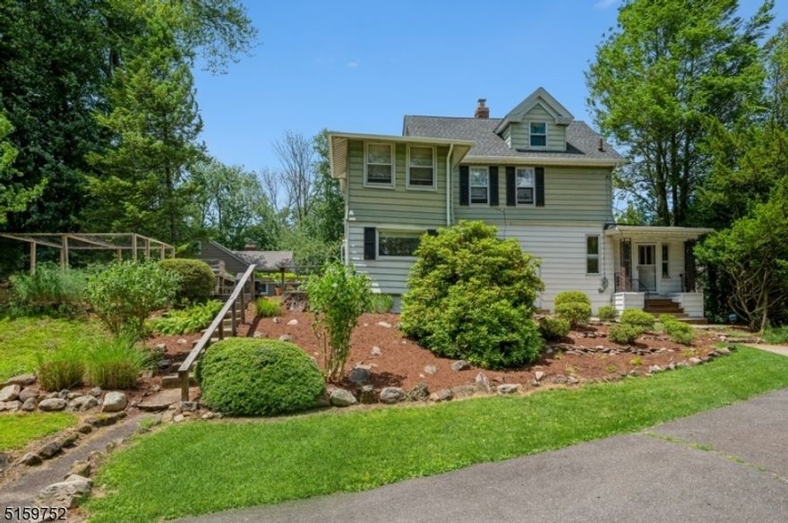 Bright and spacious home in a convenient location! Charming, well-maintained sits on an oversized, manicured lot in an ideal residential neighborhood. Within 2 min of schools, this home is convenient to major highways including Rt 24 & 78, a country club, golf course & just minutes to the train station for an easy commute to NYC. There's a lot to love about this warm and welcoming home, from the terraced rock garden front yard & entry to the light-filled interior featuring hardwood flrs, crown molding & trim work Details, a finished attic level & great natural lighting. The living and entertaining areas flow outside to a sunny deck & deep back yard wi/a dog run bordered by mature trees providing plentiful space for gardening, playing & relaxing. The vestibule opens to a spacious, open LR & dining area. The large eat-in kitchen offers ample cabinet & counterspace, rm for a dinette by the large window & access to the porch & deck overlooking the private backyard. The flow continues to a 1st flr Bd perfect for guests & a full Bth w/washer & dryer. The 2nd flr includes a large primary Bd w/a cozy sunroom, a 3rd Bd, a hallway Bth & an office. The finished attic space offers even more living space for a playroom or den. The basement contains the utilities & extra storage. Along with a nearby nine-hole municipal golf course & a seasonal aquatic center, this home situated within easy reach of The Mall at Short Hills and just 15 min to Newark International airport