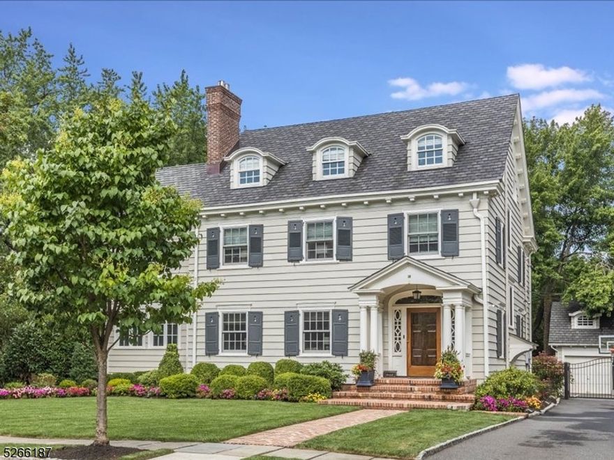 Perfectly...perfect. Beautifully updated & maintained, this 6 bedroom, 4.1 bath home in a prime GR location has been renovated with top-of-the-line, luxurious materials & finishes while maintaining the original features that make it so special. A gracious entry with leaded windows & bench seating opens to a LR with deep molding & fireplace highlighted by a gorgeous mantle. The sunny elegant DR can seat a crowd & features built-in cabinets & moldings.  The cozy sunroom with fireplace is lined with windows & opens to the backyard & pool.  The 1st level is completed with a chic powder room & a kitchen with every bell & whistle: marble counters, copious white cabinetry & pantry space, a 6-burner Wolf range, Sub-Zero refrigerator, & beverage fridge. Open to the yard & featuring a large island/breakfast bar, this is the heart of this home & an entertainer's dream. The 2nd fl is equally pristine with 4 bedrooms including a primary suite, multiple WICs & full BA with marble double vanity.  The primary has a WIC with custom built-ins & a fantastic bath with soaking tub, x-large shower, gorgeous tile work & double vanity. The 3rd fl has 2 add'l BRs with WICs & an office/flex space with full BA. The finished basement has custom cabinetry in the FR, laundry room & full BA. A pool & outdoor kitchen highlight the flat, fenced yard with plenty of room for play & entertaining. Beautiful dark hw floors throughout, CAC, updated electrical & 2-car garage. Top-rated schools & close to NY train.