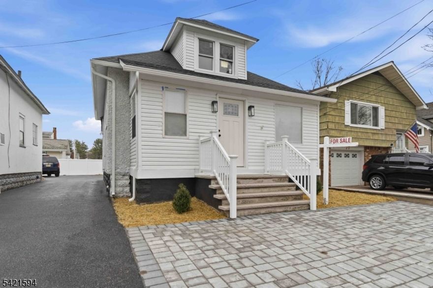 Beautifully renovated Cape Cod home in a desirable Pompton Lakes location, just minutes from schools, parks, shopping, and local amenities. This move-in-ready one-family home offers comfort, flexibility, and value. Features include a fully finished basement with a family room and an additional room, ideal for a home office, recreation space, guest use, or other permitted uses. The finished attic provides additional versatile living space. The home includes 2 full bathrooms for added convenience. Enjoy a shared driveway and a quiet, well-established neighborhood. Why rent when you can own this beautifully updated home and build equity? A great opportunity for buyers seeking a turnkey property.