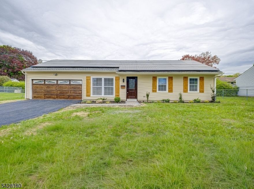 Beautifully renovated ranch with a modern glam touch! This stunning home offers 3 bedrooms, 1 updated bathroom, and a spacious 2-car garage. Fully renovated throughout, it features a functional layout with a mudroom, abundant closet space, and thoughtful upgrades. Enjoy an amazing yard?partially fenced?with a beautiful patio, gazebo, and inviting sitting area, perfect for relaxing or entertaining. Solar panels are fully paid off, providing added value and convenience for the new owner. Ideally located within walking distance to town, shops, and restaurants, with easy access to all major Routes for commuters. Don?t miss this opportunity!