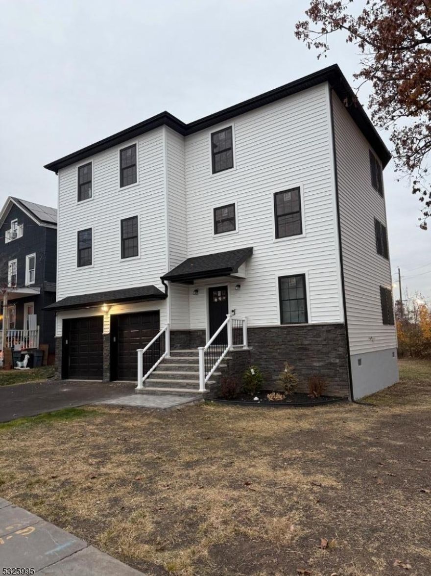 Modern one-year-old building featuring a spacious first-floor unit with 3 bedrooms and 2 full bathrooms. This home offers an eat-in kitchen with quartz countertops and stainless steel appliances, a bright living room, in-unit laundry, and hardwood floors throughout. Additional highlights include central air conditioning, a one-car garage, and an excellent location. A perfect rental opportunity!