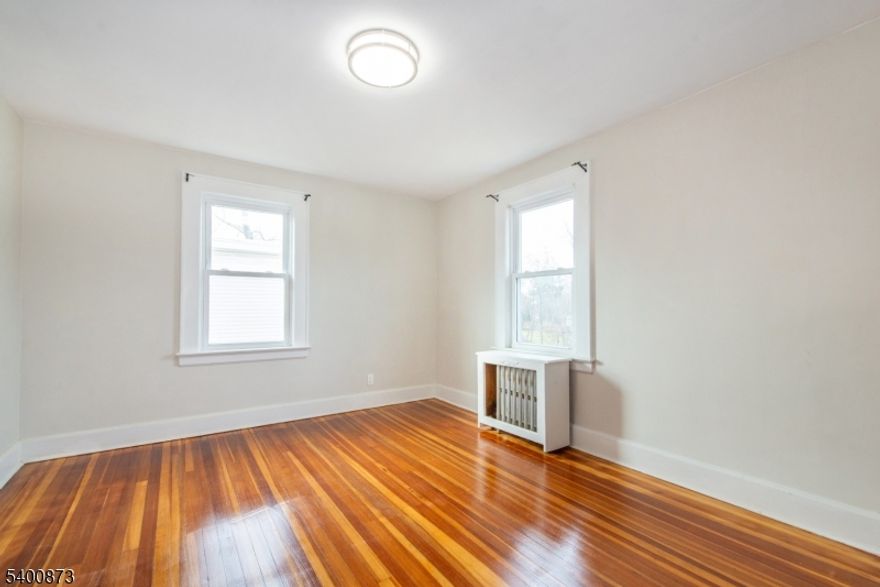 Welcome to your new home in the heart of West Caldwell, NJ! This charming 3-bedroom, 1.5-bath single-family rental offers the perfect blend of comfort, convenience, and classic character. Step inside to find freshly painted interiors and beautifully refinished hardwood floors that bring warmth and brightness to every room. The home features an updated kitchen, spacious living areas, and abundant natural light throughout.  A walk-up attic and unfinished basement provide exceptional storage space, and the basement also includes laundry for your convenience. Outside, enjoy a quiet residential setting in an amazing location close to top-rated West Caldwell schools, major transportation options, shopping, dining, and everything you need for easy everyday living.  If you're looking for a well-maintained home in a fantastic neighborhood, this rental is a must-see!  Available immediately.