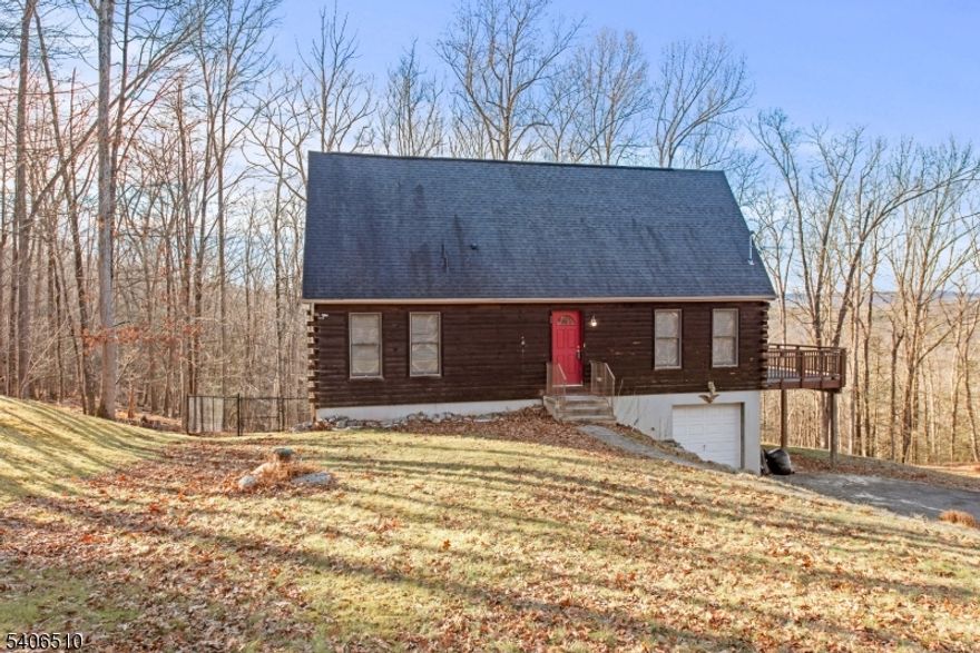 Custom 2 Bedroom 2.5 Bath Home on Park Like Setting!!!! Kitchen w/Center Island, Lots of Windows. High Ceilings. Cozy Interior. Sliders to Deck. Loft ready to be finished. Full Finished Walk Out Basement w/Bar. Great for Entertaining! Private Fenced in Back Yard. Large Deck. Wooded Back Yard. Pellet /Stove. One Car Garage.