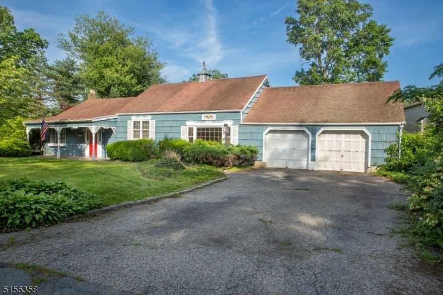 Over sized amazing lot!!! Needs work or build your dream home! 4 Bedroom, 1.5 baths addition of a 2 car garage. Gas heat.