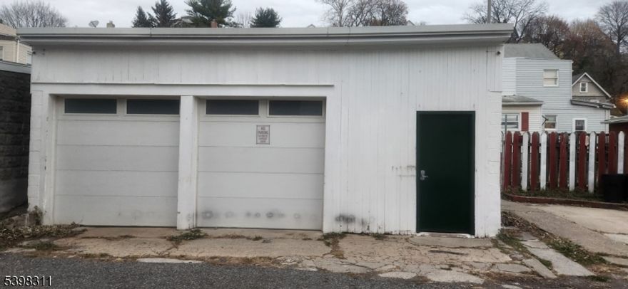 POSSIBILITIES AND OPPORUNITY ABOUND WITH THIS PROPERTY. STORAGE, WORKSHOP, GARAGE. 100 AMP ELECTRICAL PANEL IN BUILDING. 2 NEWER OVERHEAD INSULATED GARAGE DOORS WITH WINDOWS. TWO MOUNTED HEATING UNITS. OFF-STREET PARKING FOR 1 CAR IN FRONT OF GARAGE. OWNER LICENSED REALTOR.