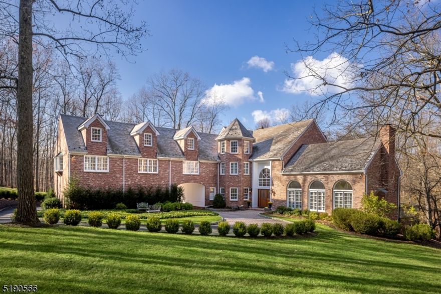 From its sought after Mountaintop setting to its gracious scale & detailing, this custom home is wonderfully inviting! The 5 lush acres are tucked into private and quiet cul-de-sac setting. Serenity prevails. Indoors, ceilings soar. Endless windows deliver light. There is an elevator off the Foyer. Sixteen rooms include 5 BRs, 4 full & 2 half Baths. Neutral fresh decor engages, French doors abound, oak floors gleam. There are five fireplaces, 4 of which are gas. Recent renovations include the stunning kitchen and primary bath. Taj Mahal quartzite countertops cast a luminous glow in the new custom Kitchen. The 11.5 foot island includes a breakfast bar & 2nd sink. Appliances are by Wolf, Sub-Zero, Miele. There is a walk-in pantry. Informal dining takes place in a surround of windows. With high ceiling & walls of tall French doors, the Living Rm is graced with an abundance of natural light. In the Library the fireplace & windows virtually reach the 2-story height & a spiral staircase advances to the bookshelf lined Loft. A tray ceiling crowns the 2-story Dining Rm. Virtually every space opens to the outdoors. In a private wing on the 2nd level is the Primary Suite with FP and adjoining Sitting Rm w/FP, two walk-in California closets and beautifully renovated Bath. Four additional bedrooms all w/ California closets and 2 Jack &Jill Baths complement this level. The walk-out finished LL enjoys an Office; Game rm, Media rm, Exercise rm, full bath and multiple storage/utility rooms.