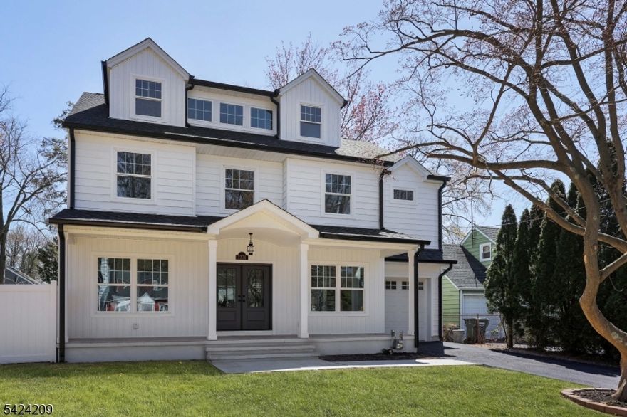 Nestled on a tree-lined street, this stunning custom home sits on an oversized lot and offers nearly 4,300 sq ft of beautifully designed living space. With 6 bedrooms and 5 bathrooms, it seamlessly blends luxury, comfort, and functionality.The main level features a bright, open floor plan with 9-foot ceilings, anchored by a gourmet kitchen complete with a large quartzite island, premium appliances, cabinetry, and a walk-in pantry. The kitchen flows effortlessly into a generous family room with direct access to a fully fenced backyard oasis, featuring an in-ground pool with a new liner and ample space for outdoor enjoyment. This level also includes an in-law suite, formal living room, mudroom/laundry room, and powder room.Upstairs, the primary suite offers a true retreat with an expansive walk-in closet and a spa-inspired bath featuring a soaking tub, oversized double shower, and dual vanity. Three additional spacious bedrooms and a full bath complete the second level, all with beautiful natural views.The third floor provides an incredible space complete with versatile finished bedroom or office and abundant storage.The fully finished lower level includes a large recreation room and full bath?ideal for movie nights, entertaining, or game day.Built by Bonomo & Sons, one of Union County?s premier luxury home builders.Enjoy your dream home in beautiful Scotch Plains with top rated schools, downtown shops, parks, and NYC trains.