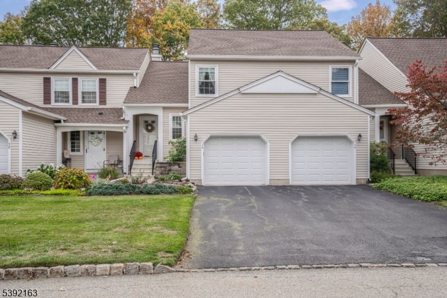 Tucked away in Newton Commons, one of Newton?s best-kept secrets, this spacious three-level townhome offers a rare opportunity for low-maintenance living in a peaceful, wooded setting. The main level features a bright living room with soaring ceilings and a wood-burning fireplace perfect for cozy winter evenings, opening to a private back deck overlooking tranquil woods. A dining room sits just off the country kitchen, which offers oak cabinetry, hardwood floors, and plenty of space for everyday living. Upstairs, you?ll find an open loft area and two spacious bedrooms ? one with a walk-in closet and the other with double closets ? along with a full bathroom and a convenient laundry closet in the hallway. The finished lower level adds even more versatility with a large recreation room, bedroom/den, utility room, and ample storage. A closet with a slop sink midway down the stairs even offers potential for an additional bath. A one-car garage with extra storage and a driveway for two cars complete the package. With replacement windows, Andersen sliders with built-in blinds, and a truly low-maintenance lifestyle, this home blends comfort, convenience, and privacy ? all just minutes to shopping, restaurants, and downtown Newton. Quick closing possible. Back on market, buyer financing fell through.