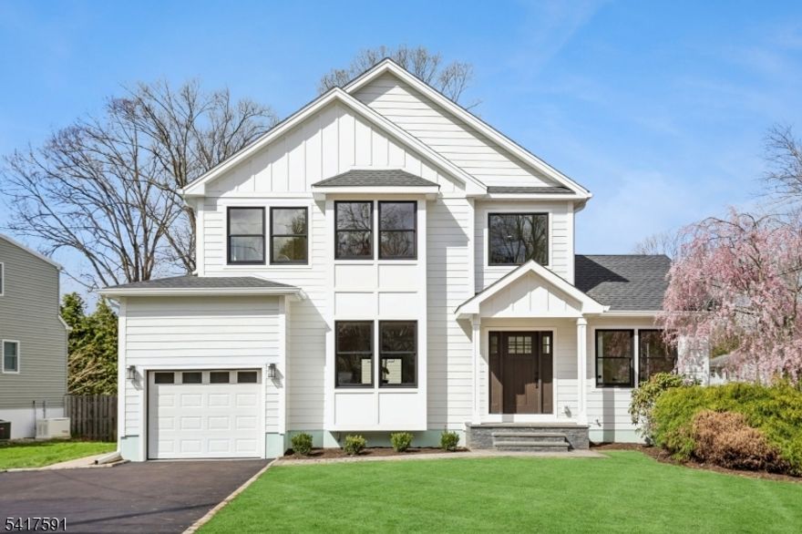 Stunning custom built 5 Beds/5.5 Baths colonial located in the heart of sought after NP.Close to vibrant downtown,train station,schools and playground.Featuring an open concept floor plan,this home is elegant,bright&sunny,the layout flows seamlessly from room to room.Boasting a gourmet eat-in kitchen w/ Thermador SS appliance,quartz countertop,glass tile backsplash and a 50 sqft walk-in pantry.The kitchen is totally open to a huge dining room w/ coffered ceiling and family room w/ gas fireplace&custom molding.Huge windows and sliding door let in tons of natural light and lead to the big deck overseeing the back yard.A spacious 1st floor in-law suit w/ an elegant full bath&vaulted ceiling,2 story foyer,mudroom,storages,attached garage complete the 1st level w/ 9 feet ceiling.Upstairs,the luxurious master suite includes designed tray ceiling,His&Her walk-in closets and a spa-like bath w/ dual sinks,free standing tub,huge stall shower & separate toilet area.One generous bedroom completed w/ a full bath&walk-in closet,2 more bedrooms w/ double closets share one full hallway bath w/ dual sinks, a laundry room finish the 2nd level.The finished basement offers more amazing space w/ huge recreation room,play room,mech room,storage rooms and a full bath.This home also boasts superb craftsmanship,Anderson window,4" oak floor,Kohler fixture,solid core interior doors,recessed & designer lights,2 HVAC,tankless water heater,Hardie plank siding w/ Azek trim and great curb appeal.Must see!
