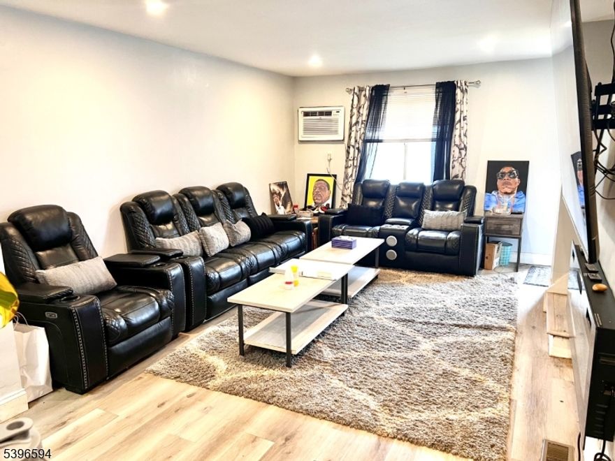 Move right into this beautifully  2-bedroom, 1-bathroom home on a quiet street in East Orange. Just two years ago, the kitchen and living room went full  under renovation, meaning you get modern aesthetics and peace of mind without the hassle of immediate repairs.  The kitchen comes fully equipped with essential appliances, including a stove, refrigerator, washer, dryer, and even a freezer everything you need from day one! Convenient Parking: Never worry about street parking with private parking space for two cars.Bonus Space: A full basement provides excellent storage or potential for a future finished area.Outdoor Living: Enjoy your own private backyard for relaxing or entertaining. Location, Location, Location: NYC Commuter Dream: It's just a quick 3-5 minute walk to the  Train Station (NJ Transit), offering a fast and direct route to New York City. Leave the traffic behind! Seamless Travel: Quick access to major highways, including the Garden State Parkway and Route 280, makes driving anywhere in New Jersey a breeze. This home offers the perfect combination of modern updates, commuter convenience, and cozy living. It's an opportunity you don't want to miss. This ia an AS-IS Sale