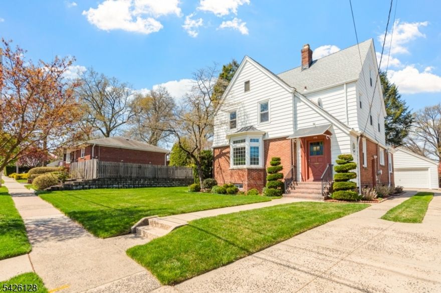 Welcome to 146 Irving Place, a beautifully maintained residence that seamlessly blends timeless charm with thoughtful updates. Gleaming hardwood floors throughout, beginning in the spacious living room, where a striking bow window fills the space with natural light. The formal dining room features French doors that open to a cozy enclosed porch, perfect for relaxing or entertaining. Just beyond, a charming swinging door leads to a generously sized eat-in kitchen that extends into a home office with a built-in desk. A convenient half bath completes the main level. Upstairs, the spacious primary bedroom offers 2 walk-in closets and a private half bath. The second bedroom boasts its own balcony ideal for morning coffee or evening stargazing while the third bedroom is comfortably sized. The finished basement provides additional living space with classic knotty pine detailing and a laundry area featuring a convenient upper-level laundry chute. Recent upgrades include a newer roof, windows, furnace, & sprinkler system. Set on a large lot with a beautifully manicured yard and a 2-car garage, this home is ideally located within walking distance of the Rutherford train station, offering a convenient commute to NYC in under 30 minutes, and quick access to all the major highways. Located within a highly regarded school system, this home offers both comfort & convenience in a sought-after community. Discover the charm of the "Borough of Trees  and make this exceptional home your own!