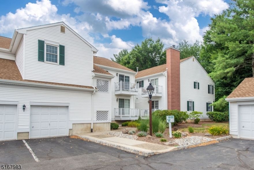 Enjoy the convenience & beauty of Spring Ridge living in this Drexel model! This 1st floor end unit 2 nestled in a corner, overlooking a park-like setting is perfect for someone looking to downsize or purchase their first home. Sliding glass doors from the living room lead to an over-sized private patio. The garage is just a few steps from the front door and the large unfinished basement area has an abundance of storage.  Spring Ridge offers acres of beautifully maintained grounds, convenient to Rt. 78, 287 & 22, buses, shopping and NYC direct trains as well as top rated schools! On site property manager, pool, clubhouse, playground, tennis courts, boccie court & even walking paths to enjoy! CAC and Furnace replaced in 2016, new hot water heater in 2017, new roof 2022. To access basement storage, go down the stairs to the left of the front door.