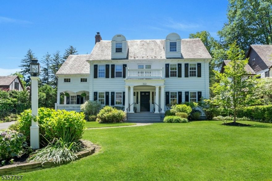 Perfectly situated on a picturesque street in the heart of Glen Ridge just moments from top-rated schools & NYC train, this elegant, meticulously updated 6 BR/5.1 BA Colonial blends timeless architecture with high-end modern updates, wrapped in warmth & thoughtful design. At its heart is a reimagined kitchen & family room featuring custom Parsons Cabinetry, quartz & leathered marble countertops, center island, high end appliances including 48in Blue Star 6 burner/griddle dual oven & Sub-Zero refrigerator, butler's pantry with wine & beverage refrigerators  & custom built-ins. This space flows into a spacious backyard with a bluestone patio perfect for al fresco dining, relaxing by the fire pit & hours of play.  A beautifully curated second-floor expansion adds a fourth bedroom with en-suite bath, a sunlit landing with window seat & a stunning primary suite custom walk-in closet/dressing room with bonus washer/dryer hookup.  A fully renovated hallway bath offers a tub, shower and custom cabinetry. The third floor includes two more bedrooms & full bath ideal for guests, office or playroom. A recently finished lower level offers high ceilings, full bath & flexible space with wet bar. Highlights include a two-car attached garage with entrance to custom mudroom, Sonos sound system, central air & rebuilt front balcony. 322 Washington Street offers the very best of Glen Ridge...classic charm, modern comfort & an unbeatable location in one of the town's most beloved neighborhoods.