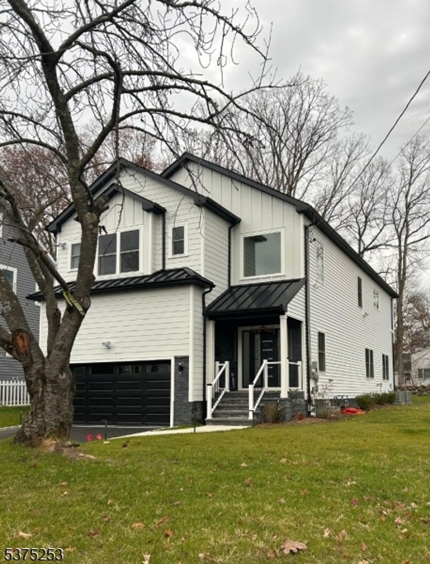 SPACIOUS 2025 NEW Construction Home! CHIC 6 BD + 5 BA COLONIAL w/ OPEN FLOOR PLAN in PRESTIGIOUS Livingston! Main Level features HGTV Eat-In Kitchen w/SS Appliances, Quartz ISLAND and SLIDER out to TREX Deck overlooking Level Backyard. 2ND Floor hosts an EN-SUITE MASTER with FULL Bath and 2 WIC closets + 3 Additional bedrooms, 2 Bathrooms + Laundry. Finished Basement houses a Bedroom/Office, Spacious REC Room and FULL bath. Hardwood floors, Custom features & recessed lighting throughout the home. Convieniently located close to Top Rated HIGH SCHOOL, NYC Bus and SHOP RITE.