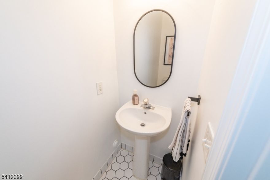 Welcome to 122 Riverwalk Way in the desirable Riverwalk complex in Clifton! This 2 bedroom, 2 1/2 bath interior townhome boasts open concept main floor living with high ceilings and large window letting in plenty of natural light. First floor features living/dining combo with gas fireplace and sliders to outside patio with adjacent kitchen featuring a pantry and breakfast bar ideal for everyday living and entertaining as well as powder room, laundry/utility room and entrance to private attached 1 car garage. Second floor features a spacious primary suite with walk-in closet, sliders to a lovely balcony perfect for enjoying a morning coffee or an evening breeze and full bath with double vanity, jetted tub and stall shower. A guest bedroom with double closet and main full bathroom with tub/shower complete the second floor. Other features include central air, newer laminate flooring, additional closet space with large upstairs hall closet, garage/driveway parking with additional visitor parking and nearby on-street parking. Various amenities are offered including outdoor pool, scenic walking/jogging trail, tennis/pickleball courts, clubhouse and pet area for residents' enjoyment. This impressive complex is close to major highways, NYC transportation, shopping and dining making it an excellent location for comfortable and convenient living! Make your appointment today!