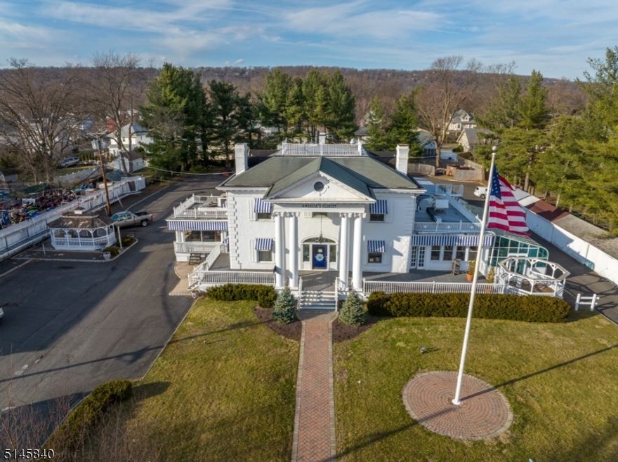 Development opportunity or even better yet, use this amazing opportunity to utilize this existing approx. 9100 sqft building.  Situated in the heart of Bound Brook this property is zoned as MU2 (mixed use), it has 55+ parking spaces, 200' of road frontage and 1.28 acres, which make the possibilities endless!  Formally used as restaurant/hotel and is currently being used as a flower and bike shop (both businesses will leave upon passing of title).  There are commercial grade freezers and refrigerators on site.  There is also a Broad C liquor license available, the price is TBD.  Land use requirements available upon request.