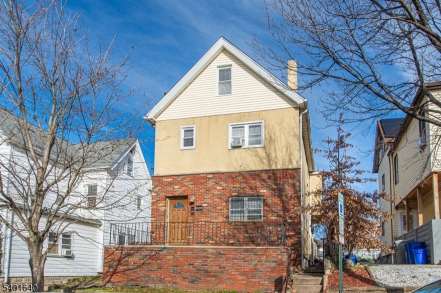 Well-maintained two-family home offering two spacious units, each with 2 bedrooms and 1 full bath. The first-floor unit features a comfortable living area and an eat-in kitchen with ample cabinet space. The second-floor unit includes a bright living room, eat-in kitchen, and two well-sized bedrooms. Additional features include a backyard for outdoor use, basement storage, and separate utilities. Conveniently located near local parks, shopping, schools, and major transportation routes. A suitable option for owner-occupants or investors seeking rental income in a central Belleville location.