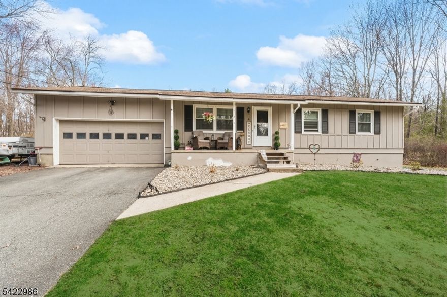Stunning 3 bedroom, 1.5 bath ranch set on approximately 2 beautiful acres! This well appointed home offers a full finished basement featuring a spacious family room, office, laundry room, and additional storage room providing plenty of flexible living space. A charming wood burning stove adds character to the lower level. Enjoy the outdoors from the inviting front porch, back deck, and covered patio. Complete with an oversized garage, this property offers the perfect blend of space, functionality, and privacy. A fantastic opportunity you won't want to miss! * Best and final due by Wed 4/15 12pm*